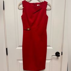 Calvin Klein Fitted Red Dress With Gold Detail And Zipper Up The Back. This Dress Has Some Stretch And Fits True To Size. I Am 5’5” And It Hits Just At The Knee. Never Worn. With Tags On Calvin Klein Red Formal Dress, Calvin Klein Red Dresses, Chic Red Calvin Klein Dress, Calvin Klein Red Party Dress, Red Calvin Klein Party Dress, Fitted Red Dress, Red Fitted Dress, Below The Knee Dresses, Calvin Klein Red