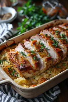 Roast pork loin garnished with herbs served on a bed of caramelized potatoes and onions in a baking dish. Oven Roasted Dinners, Pork Tenderloin Sauerkraut, Roast Pork Recipes, Oven Roasted Pork Loin, Roasted Pork Loin