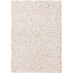 a white and black speckled surface with different colors