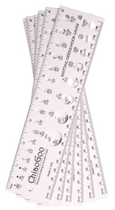 six rulers with numbers on each side and one ruler in the middle, set against a white background