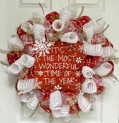 a red and white wreath that says it's the most wonderful time of the year