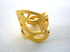 One of a kind handmade Gold Plated Organic Brass Ring made with the ancient lost wax method. No two rings will be exactly the same as they are completely handmade one by one. I made the Gold Plated Organic Brass Ring in wax and then had it casted in bronze and then yellow gold plated to avoid getting oxidised. This listing is for the Gold Plated Organic Brass Ring you can see in the picture it is yellow gold plated bronze. B A C K to my shop >> www.etsy.com/shop/StoixeioJewelry Made this w Matte Gold Brass Rings For Gift, Matte Gold Brass Rings As Gifts, Hand Cast Gold Open Ring, Gold Hand Forged Open Ring, Hand Forged Gold Open Ring, Hand-forged Gold Open Ring, Gold Hand Cast Open Ring Jewelry, Gold Open Ring Hand Forged, Hand Cast Gold Brass Ring