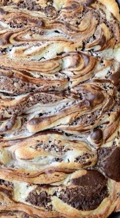 a pan filled with bread on top of a wooden table