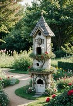 a bird house in the middle of a garden