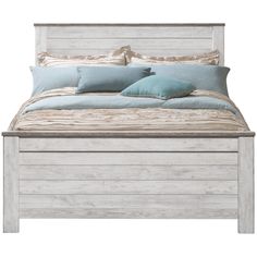 a white bed with blue pillows and blankets on it's headboard, against a white background