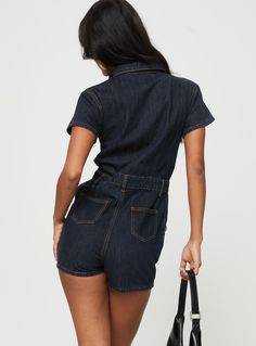 Dark wash denim romper  Classic collar, button fastening at front, twin chest & hip pockets, belt looped waist, back pockets  Good stretch, unlined   98% cotton 2% spandex  Cold hand wash Denim Belted Overalls Jumpsuits And Rompers, Fitted Shortalls With Pockets For Workwear, Fitted Jumpsuits And Rompers With Pockets, Fitted Cotton Denim Utility Jumpsuit, Medium Wash Denim Jumpsuit With Belt Loops, Trendy Short Denim Jumpsuit With Pockets, Utility Denim Shortalls For Work, Casual Cotton Jumpsuits And Rompers With Belt Loops, Fitted Denim Jumpsuit