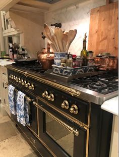 a kitchen with an oven, stove and counter top