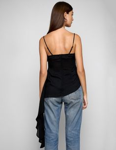 FINAL SALEBlack ruffled asymmetric cascade top . Brand Pixie Market 100% eco friendly tencel Adjustable shoulder straps Hidden side zipper closure Model is wearing a size small and model's height is 5.9"/175 cm