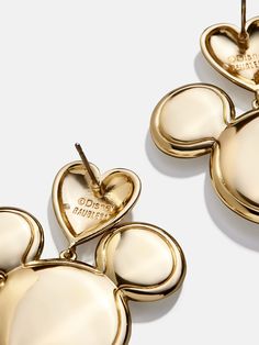 Show off your Disney love with the Mickey Mouse Disney Gold Heart Earrings. These earrings feature Mickey with love literally sitting on his head. Fully colored in gold, this statement piece pairs well with any ‘fit. This is an officially licensed Disney product. Gold Heart Earrings, Disney Gold, Gold Heart Earring, Mickey And Friends, End Of Year, Disney Love, Gold Heart, Heart Of Gold, Heart Earrings