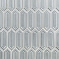 an image of a glass tile pattern that looks like hexagonals on the wall