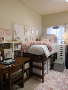 a bed room with a neatly made bed and desk