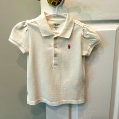 Nwt! Ralph Lauren White Polo Shirt W/ Slight Ruching. Size 24 Mags. Very Cute! Ralph Lauren Cotton Tops For Spring, Cute Summer Tops By Ralph Lauren, Cute Ralph Lauren Summer Tops, Ralph Lauren White Top For Spring, Cute Fitted Ralph Lauren Tops, Fitted Cute Ralph Lauren Tops, Classic Ralph Lauren Summer Tops, Ralph Lauren Collared Summer Tops, Cute White Ralph Lauren Top