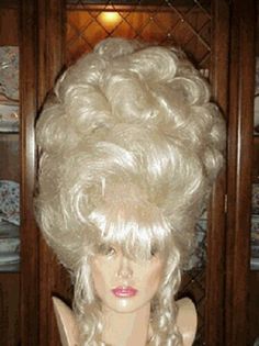 Vegas Girl Wigs   Description Vegas girl Wigs Stylist to the stars for over 35 years. Thanks for looking at our auctions. All of our fine quality wigs arrive to you brand new. Each and every wig we offer is of exceptional quality and styled just for you. THESE WIGS ARE ALL CUSTOM STYLE NEVER 2 EXACTLY ALIKE. SPECIAL COLORS AND AWESOME LOOKS WANT TO LOOK DIFFERENT AND A SHOWSTOPPER, THESE ARE THE WIGS THAT YOU NEED TO GET. awesome, sultry, unbelievable hair styles Every wig we offer is of excepti Big Updo, Curled Bangs, Wigs Blonde, Blonde Updo, Evening Hairstyles, Bouffant Hair, Updo Hairstyle, Quality Wigs, Voluminous Curls