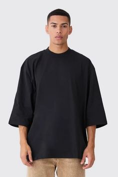 Extreme Oversized Extended Neck Heavy Weight T-shirt | boohooMAN USA Black Relaxed Fit T-shirt, Urban Oversized Solid T-shirt, Solid Color Oversized Urban T-shirt, Modern Relaxed Fit Top With Drop Shoulder, Modern Tops With Relaxed Fit And Drop Shoulder, Black Relaxed T-shirt For Summer, Oversized Modern T-shirt For Summer, Modern Oversized T-shirt For Summer, Modern Oversized Short Sleeve Tops