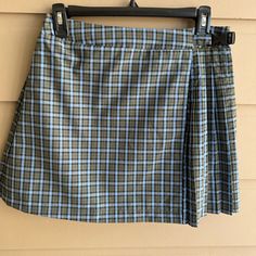 Wild Fable Plaid Pleated Mini Skirt Grey/Blue Color Never Used. Size S 16” Length Plaid On The Back 83%Polyester/17%Rayon Machine Wash Casual Green Skirt With Short Inseam, Casual Plaid Skirted Skort, Casual Skirted Skort For School, Casual Lined Skort For School, Preppy Green Lined Skort, Green Lined Skirt Bottoms For School, Plaid Pleated Mini Skirt, Tie Dye Denim, White Mini Skirt