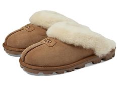 UGG Coquette - Women's Slippers : Chestnut : This shoe runs big and is available in whole sizes only. Order one size down than usual and if between sizes, order 1 1/2 sizes down from your usual size (for example, if you wear a size 9 1/2, order a size 8). The Coquette embraces the essence of a slipper with the radiant style UGG is known for. Signature Twinface upper with a sheepskin cuff for a cute can cozy wear. UGG signature Twinface sheepskin is treated on both sides to provide maximum softness and comfort. Polyester binding. Genuine 17mm sheepskin sockliner wicks moisture away and allows air to circulate, keeping feet dry. Treadlite by UGG outsole delivers traction control. Fit should be snug, but not uncomfortable. Footwear will give a little as fleece footbeds form to each individual Ugg Coquette Slippers, Winter Uggs, Ugg Coquette, Can Cozy, Cozy Wear, Trendy Shoes Sneakers, Gifts Mom, Ugg Slippers, Women's Slippers