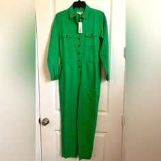 Stylish Bright Green Long Sleeve Jumpsuit With Functional Pockets Adjustable Waist And Tapered Legs. Made From 98% Organic Cotton With 2% Spandex. Green Stretch Jumpsuits And Rompers For Workwear, Green Long Sleeve, Long Sleeve Jumpsuit, Bright Green, Tapered Legs, Pant Jumpsuit, Organic Cotton, Pants For Women, Jumpsuit