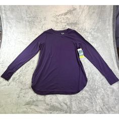 Stay Warm And Stylish In This Purple Tek Gear Women's Medium On The Go Long Sleeve Shirt. Featuring Thumb Holes For Extra Comfort, This Shirt Is Perfect For An Active Lifestyle. Brand: Tek Gear Color: Purple Size: Medium Style: T-Shirt Material: Polyester And Spandex Special Feature: Thumb Holes Features: T-Shirt Size: Womens Medium Condition: New With Tags Brand New Long Sleeve Workout Top, Athleisure Tops, Long Sleeve Workout, Purple Shirt, Womens Long Sleeve Shirts, Running Tops, Style T Shirt, Purple Fashion, Long Sleeve Tunic