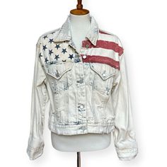 Blank Nyc Unmet Expectations American Flag Print Distressed Denim Jacket Denim Jacket Has Flag Detailing For A Patriotic Look! Brand: Blanknyc Size: Medium Color: Acid Wash/Faded/Distressed Denim - Off-White Background With Faded Blue & Red Oversized Silhouette. Long Sleeves With Button Cuffs, Spread Collar, Full Button Front, 2 Button-Flap Chest Pockets, Straight Hemline Fabric Content: 100% Cotton. Machine Washable Approx. Flat Measurements: 22” Length X 22” Sleeve X 20.5” Pit-Pit X 20" Should Americana Style Long Sleeve Outerwear For Fall, Americana Style Long Sleeve Fall Outerwear, Distressed White Denim Outerwear, Distressed White Denim Jacket For Fall, White Distressed Denim Jacket For Fall, Fall Americana Denim Jacket, Fall Americana Style Denim Jacket, White Distressed Long Sleeve Outerwear, Unmet Expectations