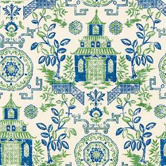 a blue and green wallpaper pattern with small houses, trees, and flowers on it