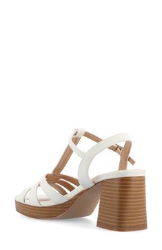 Elevate any look with this faux-suede T-strap platform sandal featuring a foam-cushioned footbed and stacked block heel. 2 3/4" heel; 1/2" platform Tru Comfort Foam footbed Synthetic upper, lining and sole Imported Synthetic T-strap Heels For Spring, Summer T-strap Sandals, Summer T-strap Sandals With Padded Heel, Modern T-strap Heels For Summer, White T-strap Heels For Spring, Spring T-strap Sandals With Padded Heel, Summer T-strap Heels With Stacked Heel, Spring T-strap Sandals With Stacked Heel, Spring Platform T-strap Heels