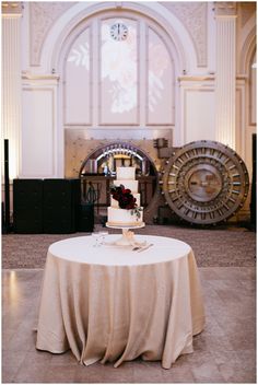 a wedding cake sitting on top of a table