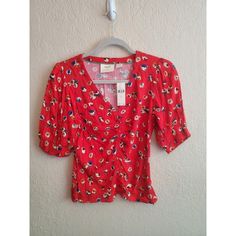 This Lovely Blouse From Maeve By Anthropologie Is A Must-Have For Any Fashion-Forward Woman. Featuring A Vibrant Red Color And A Beautiful Floral Pattern, This Blouse Is Perfect For Adding A Pop Of Color To Any Outfit. With Short Sleeves And Ruched Detailing, It Is Both Feminine And Comfortable. It Is A Size 2 And Has A Regular Fit, Making It Perfect For Many Body Types. The Blouse Has Never Been Worn And Comes With Tags Attached, Ensuring That It Is In Pristine Condition. Don't Miss Out On The Bow Detail Dress, Lace Inset, Anthropologie Top, Distressed Black Jeans, Pink Plaid, Boho Tops, Lace Sleeves, Dress With Bow, Vibrant Red