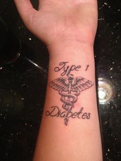 a hand with a tattoo on it that says type 1 diabets and a stethoscope