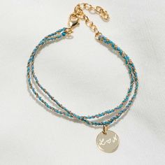 Available in a range of striking colours, our beautifully handwoven Personalized Braided Chain Bracelet is the perfect mix of sentiment and style, hand-engraved with your own special words.Available in 18K Champagne Gold PlatedAdjustable chain from 5.5 to 7Charm: 10mm diameter, 0.5mm thicknessSecure clasp fasteningCharm can't be removed from this chainHand-engraved in our London workshopSent with love in a complimentary gift boxAny slight variations in lettering depth, spacing and alignment from Green Tangerine, Special Words, Champagne Gold, Hand Engraving, Chain Bracelet, Bag Making, Gift Bag, Turquoise Bracelet, Hand Weaving