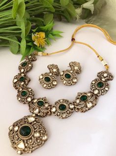 Fine Quality Sabyasachi inspired Victorian style kundan Polki Necklace with matching Earrings. Highest quality and craftsmanship Free shipping Since natural semiprecious beads are used in this necklace, Color and shape of the beads may vary slightly Please let me know if you have any questions Ornate Kundan Jewelry Sets For Ceremonial Use, Ornate Chandbali Kundan Necklace For Festive Occasions, Ornate Chandbali Kundan Necklace Hand Set, Ornate Hand Set Kundan Necklace For Celebration, Ornate Kundan Necklace For Celebration, Luxury Multicolor Traditional Kundan Necklace, Ornate Hand Set Chandbali Kundan Necklace, Ornate Heavy Kundan Necklace For Celebrations, Ornate Kundan Necklace With Stone Work For Celebrations