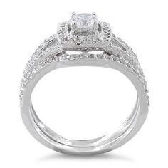 Top of ring height: 8.44mm

Top of ring width: 8.4mm

Band width: 3.3mm

Shank width: 2.2mm


Stone material: clear cubic zirconia

Center stone size: 4mm

Stone shape: round

Center stone carat weight: 0.3 ct.

Total number of CZ stones: 80

Stone setting: Prong setting


Metal: 925 sterling silver

Plating: rhodium plated

Finish: high polish White Cubic Zirconia Halo Ring For Promise, Cubic Zirconia Bridal Sets With Halo Setting, Promise White Cubic Zirconia Halo Ring, Dazzling Bridal Sets With Center Stone For Promise Ring, Bridal Sets With Halo Setting, Cubic Zirconia Halo Ring For Wedding With Round Band, Wedding Crystal Ring With Halo Design In Cubic Zirconia, Diamond White Cubic Zirconia Bridal Sets For Promise Ring, White Cubic Zirconia Bridal Sets For Promise Ring