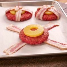 bacon, cheese and pineapple patties are arranged in the shape of a cross