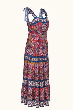 Get ready to turn heads in this dreamy dress from Shoshanna! This stunning midi features tie straps and a flowy tiered skirt, adorned with an artful mix of floral and paisley patterns in vibrant colors. Perfect for any sunny occasion, this dress will make you feel effortlessly beautiful. Style with a woven sandal or add some glam with metallic gold heels. Size 10 55% Viscose, 45% Rayon Unlined Hidden back zip Tie-shoulder straps Smocked back Square neckline A-line silhouette Bust 33" Waist 36" Shoulder to hem 52.5" Multicolor Paisley Print Beach Dress, V-neck Midi Dress With Paisley Print For Beach, Metallic Gold Heels, Beach Sundress With Paisley Print And V-neck, Patterned Paisley Print V-neck Maxi Dress, Multicolor V-neck Maxi Dress With Paisley Print, Zip Ties, Gold Heels, Dreamy Dress