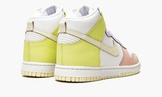 The Women's Nike Dunk High “Lemon Twist” is a women’s version of the classic basketball shoe in a summer-inspired colorway. With its various pastel colors, the “Lemon Twist” is primed for casual wear during the warmer months of the year, but no less appealing no matter the season. The upper’s white leather base is contrasted by pastel-colored leather panels, including light pink on the toe cap, violet purple on the eyelets, and neon green on the collar and heel. A light green leather Swoosh appe Lemon Twist, Months Of The Year, Dunk High, Nike Dunk High, Casual Sneakers Women, Violet Purple, Nike Sports, Colored Leather, Sneaker Collection