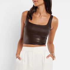 Nwt Faux Leather Cropped Tank Top Description The Perfect Way To Elevate Your Look This Season With This Simple, Yet Edgy Faux Leather Cropped Tank. Looks Great Styled Solo Or Layered Up. Features & Fabric Square Neck Sleeveless Faux Leather; Lined Front And Back Straight Hem; Cropped Length Body Contour, Body Contouring, Black Crop, Moto Jacket, Fabric Squares, Crop Tank, Cropped Tank Top, Square Neck