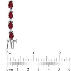 Dress her wrist in luxury with this gemstone and diamond bracelet. Crafted in cool 14K white gold, this beautiful line bracelet showcases 6.0 x 4.0mm oval-shaped bright red rubies separated by sparkling diamonds. Radiant with 3/8 ct. t.w. of diamonds and a brilliant polished shine, this 7.0-inch bracelet secures with a box clasp. Red Diamond Oval Bracelet, Red Oval Diamond Bracelet, Red Oval Diamond Classic Bracelet, Red Oval Diamond Gemstone Bracelet, Red Oval Tennis Bracelet Fine Jewelry, Red Oval Classic Diamond Bracelet, Classic Red Oval Diamond Bracelet, Red Oval Fine Jewelry Tennis Bracelet, Red Diamond Oval Tennis Bracelet