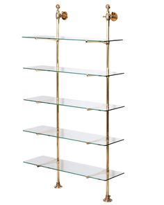 three glass shelves with brass fixtures