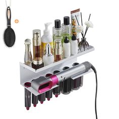 a hair dryer, combs and other items are arranged on a shelf next to each other