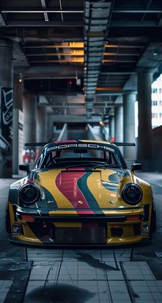 a yellow and red sports car parked in a parking garage