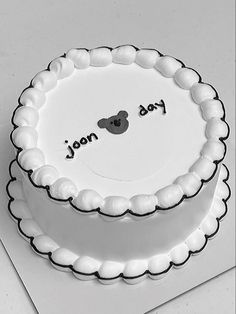 a mickey mouse cake with the word dad and son written on it's side