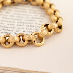 Talk about Georgian-era chain vibes! This rolo chain is incredibly charming - and such a big and bold look on the wrist as well. Each is beautifully textured for a look that is both vintage in feel and elegant. The links are also perfect for hanging charms! 18kt yellow gold, and measures 8.8" in length (we can adjust the length as needed). Please see qualitative report for more information. Modern Mens Rings, Hanging Charms, Art Jewelry Earrings, Georgian Era, Antique Watches, Photos Hd, Gold Chain Jewelry, Antique Engagement, Vintage Band