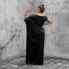 "Luxuriously soft black off the shoulder kaftan. This effortless maxi dress has been our best seller since we launched it and it is easy to see why. Check the raving reviews! Made from super eco textile bamboo jersey and drapes like a dream making it so versatile - wear it for a formal night out, or lounge at home in it. The perfect mother's day gift! Bamboo jersey is easy to care for - machine wash cold and line dry. You will never want to take this off. Perfect for the beach, amazing over legg Black Batwing Sleeve Evening Dress, Black Evening Dress With Batwing Sleeves, Evening Maxi Dress With Batwing Sleeves, Oversized Black Evening Dress, Oversized Maxi Dress For Evening, Elegant Oversized Maxi Dress For Evening, Elegant Oversized Evening Maxi Dress, Eco Textile, Black Kaftan