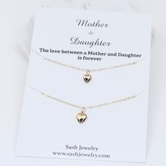 "14K Solid Gold Mother Daughter Necklace Set This necklace set is a nice gift for a mother and daughters. These necklaces will arrive in a nice gift box. If you prefer the necklaces be shipped in an individual box, please let me know. Mother necklace: The heart charm is 14K gold, it is about 13.5mm x 7.5mm The necklace is 14k gold 18\" Daughter necklace: The heart charm is 14K gold, it is about 11mm x 6mm. The necklace is 14k gold 16\" Please read our policy before you place your order. https:// Fine Jewelry Necklace For Mom On Valentine's Day, Gold Heart Necklace For Anniversary And Mother's Day, Gold Heart Necklace For Mother's Day Anniversary, Yellow Gold Heart Jewelry As A Gift For Mom, Heart-shaped Fine Jewelry Gift For Mom, Elegant Necklace For Father's Day Gift, Gold Heart Necklace As A Fine Jewelry Gift, 14k Gold Heart Necklace For Mother's Day, Heart-shaped 14k Gold Jewelry Gift For Mom