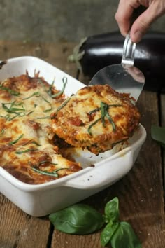 baked eggplant parmesan in a casserole dish