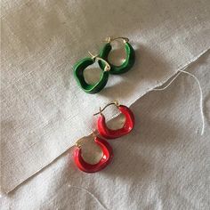 [MATERIAL]: Brass with enamel. [HOOP SIZE]: 20mm or 0.78" Green Enamel Hoop Jewelry, Red Enamel Round Earrings, Red Round Enamel Earrings, Green Enamel Hoop Earrings, Red Enamel Trendy Earrings, Red Small Hoop Earrings For Everyday, Small Hoop Red Earrings For Everyday, Everyday Enamel Hoop Earrings, Small Red Hoop Earrings For Everyday Wear