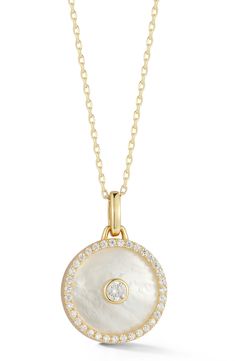 Elevate your wardrobe in a statement-making pendant necklace that's ideal as a standalone piece or as a layered look. 18" length; 5/8" diameter pendant Sterling silver/rhodium plate or 14k-gold plate/mother-of-pearl/cubic zirconia Made in Turkey Round Pearl Pendant Necklace, Elegant Medallion Pearl Necklace With Pendant, Elegant Medallion Necklace In Mother Of Pearl, Elegant Mother Of Pearl Medallion Necklace, Elegant Medallion Necklace With Pearl Chain, Pearl Pendant Medallion Jewelry In Mother Of Pearl, Pearl Pendant Medallion Necklace In Mother Of Pearl, Pearl Medallion Pendant Jewelry In Mother Of Pearl, Mother Of Pearl Pendant Necklace With Pearl Pendant