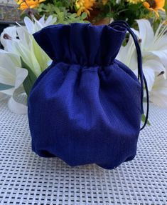 Elegant and simple heavy silk bag / money bag / purse ! Ideal for your wedding day, night out, party ,special occasion Color: navy blue Fabric : silk Lining : poliester satin Closes and opens due to elastic , very comfortable for aduls and and children. Size : approx. 18 cm x 18 cm YOU CAN FIND MATCHING SATIN SHAWL , SASH AND HEADBAND IN MY ETSY SHOP! We accept credit cards! Elegant Blue Evening Bag For Wedding Guest, Handmade Blue Evening Bag For Formal Occasions, Blue Clutch Bag For Wedding Guest, Elegant Formal Gift Bag Pouch, Blue Handmade Evening Bag For Wedding, Handmade Blue Bag For Events, Blue Handmade Bag For Events, Blue Pouch Evening Bag For Events, Elegant Formal Gift Pouch