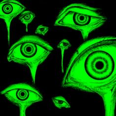 an image of some strange looking eyes in the dark green light with black and white background