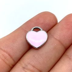 Zinc alloy pink heart charm. Pink Heart Pendant Charms As Gift, Pink Heart Charm Jewelry For Valentine's Day, Nickel-free Pink Heart Cut Jewelry, Pink Heart Charm Pendant Jewelry, Cute Heart-shaped Metal Jewelry, Personalized Pink Double Heart Jewelry, Personalized Double Heart Pink Jewelry, Rose Gold Heart Charms For Valentine's Day, Pink Pendant Jewelry With Charms