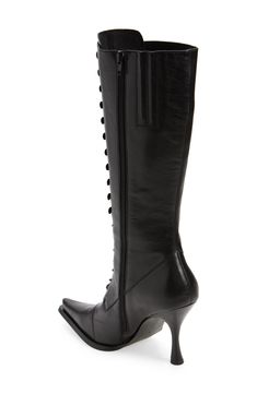 An exaggeratedly elongated cap toe and flared stiletto highlight the sculptural silhouette of this sleek leather boot designed to snugly hug the leg. 3 1/2" heel 12" shaft; 12" calf circumference. Narrow calf Lace-up style; side zip closure Leather upper and lining/synthetic sole Imported Fitted High Shaft Leather Heeled Boots, Fitted Leather Gothic Boots, Gothic Fitted Boots For Formal Occasions, Fitted Gothic Boots For Formal Occasions, Fitted Gothic Leather Boots, Fitted Knee-high Boots In Calf Leather With Reinforced Heel, Fitted Knee-high Calf Leather Boots With Reinforced Heel, Gothic Boots With Reinforced Heel And Pointed Toe, Formal Gothic Boots With Pointed Toe